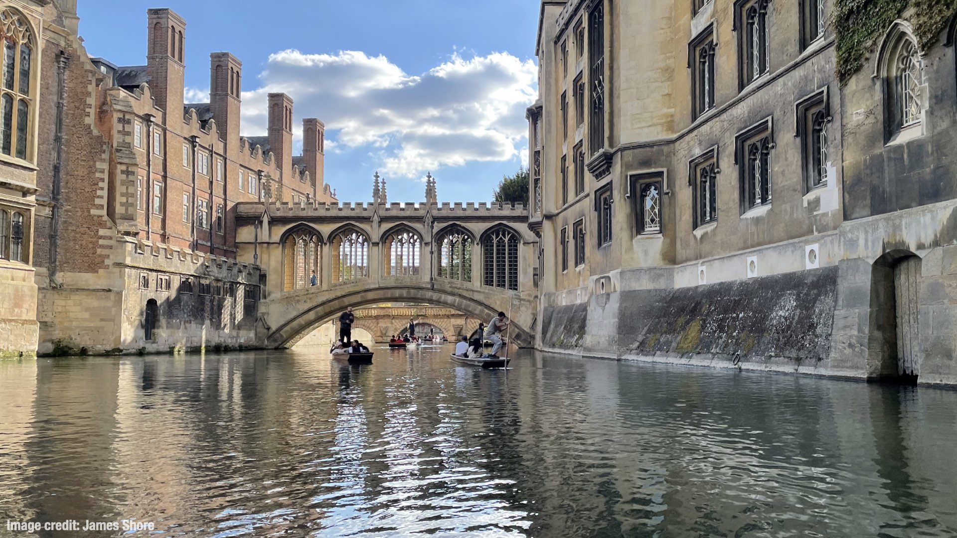 A picture of buildings at Cambridge University, taken from the water of the River Cam.